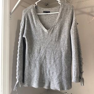 Loose gray sweater